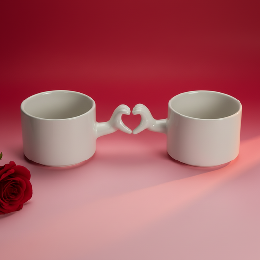 Handmade ceramic mug with heart hand gesture handle, front view
