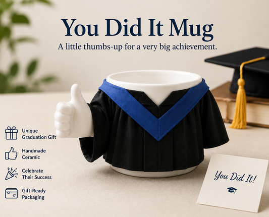 Handmade You Did It graduation mug wearing a removable black gown and blue hood