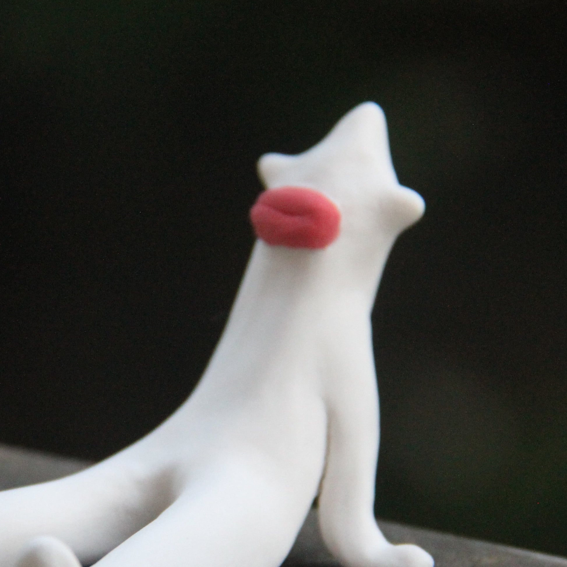 Ugly Buddies Little Lounger handmade ceramic desk buddy on wooden shelf